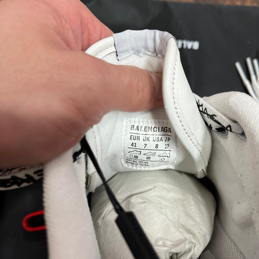Balenciaga sneaker size label inside tongue with EUR and UK sizing details