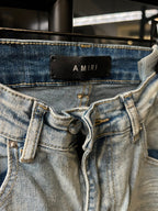 Amiri light-wash jeans waistband with lace-up detail and belt loops