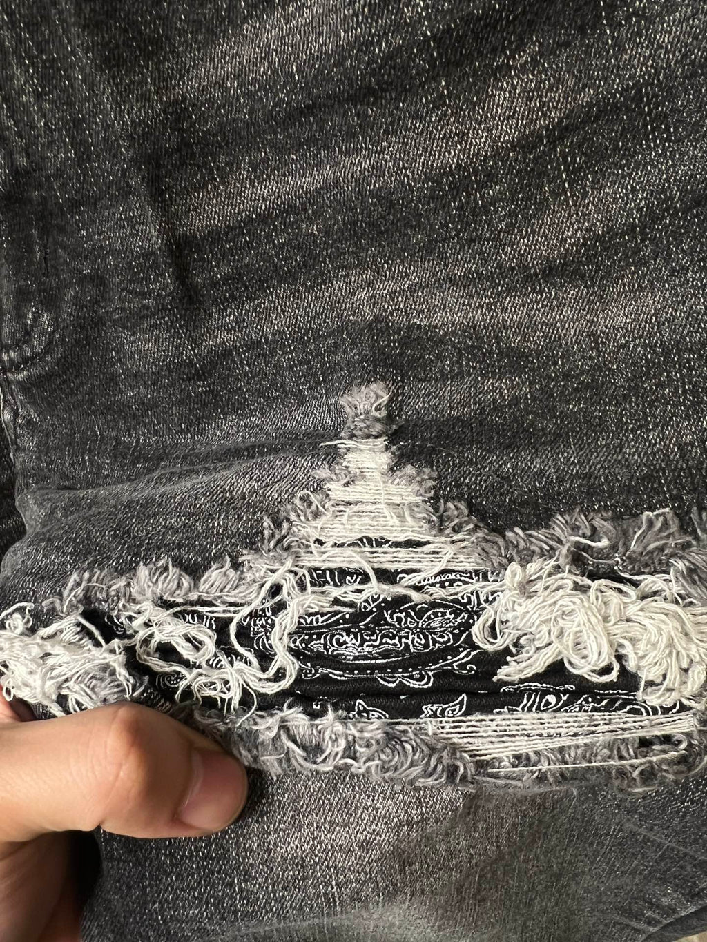 Gray denim cuff with frayed embroidered-look tear detail