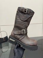 Balenciaga women’s mid-calf leather boots with buckles and rugged lug sole