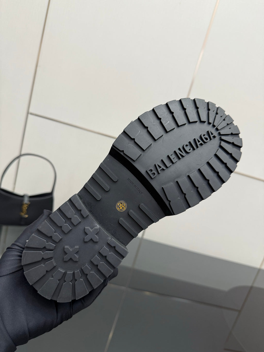 Balenciaga women’s boot outsoles with deep tread and embossed BALENCIAGA lettering