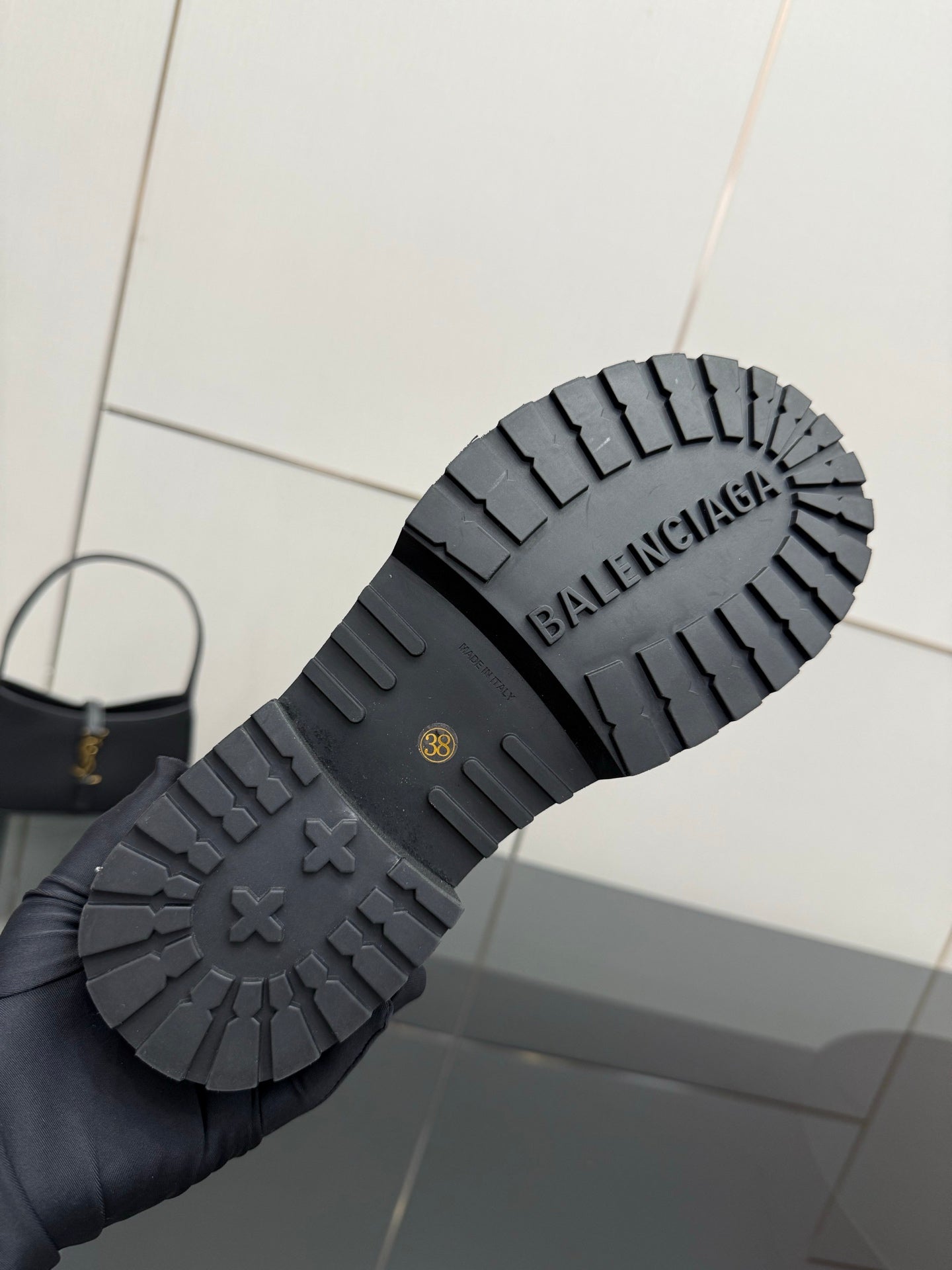 Balenciaga women’s boot outsoles with deep tread and embossed BALENCIAGA lettering