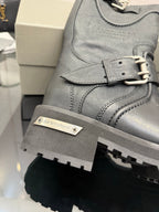 Gray leather boot upper with logo patch and lace-up eyelets
