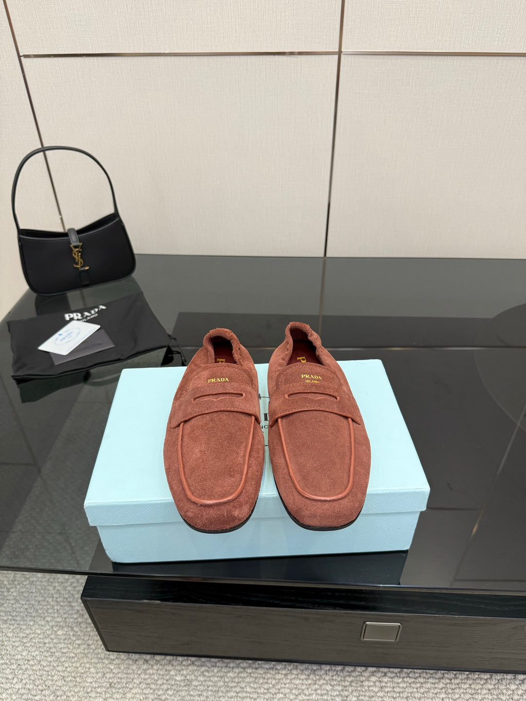 Prada rust-brown suede loafers with dual strap and cushioned footbed