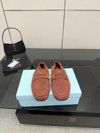 Prada rust-brown suede loafers with dual strap and cushioned footbed