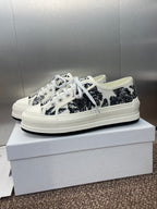 Unisex Dior sneakers, white canvas with black palm print, white laces and low sole
