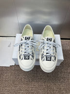 Unisex Dior sneakers, white canvas with black palm-print panels and lace-up front