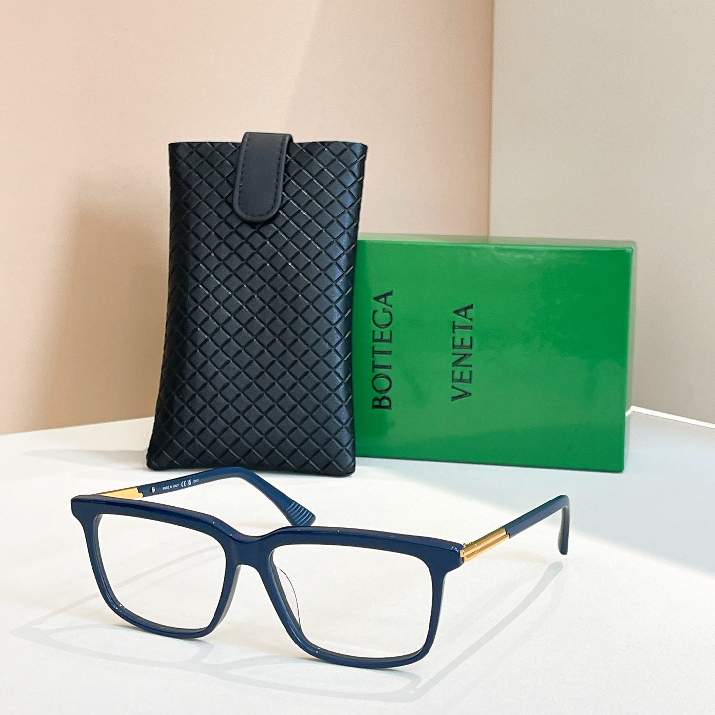 Bottega Veneta glasses with blue frame, gold temples, clear lenses, in leather case