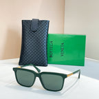 Bottega Veneta glasses with green frame, dark lenses, gold temples, in leather case