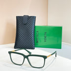 Bottega Veneta glasses with green frame, gold temples, clear lenses, in leather case