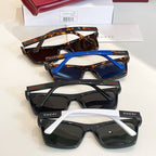 Assorted sunglasses set: black, tortoiseshell, blue, and white-frame styles with tinted lenses.