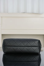 Chanel quilted shoulder bag back panel, diamond pattern in dark leather