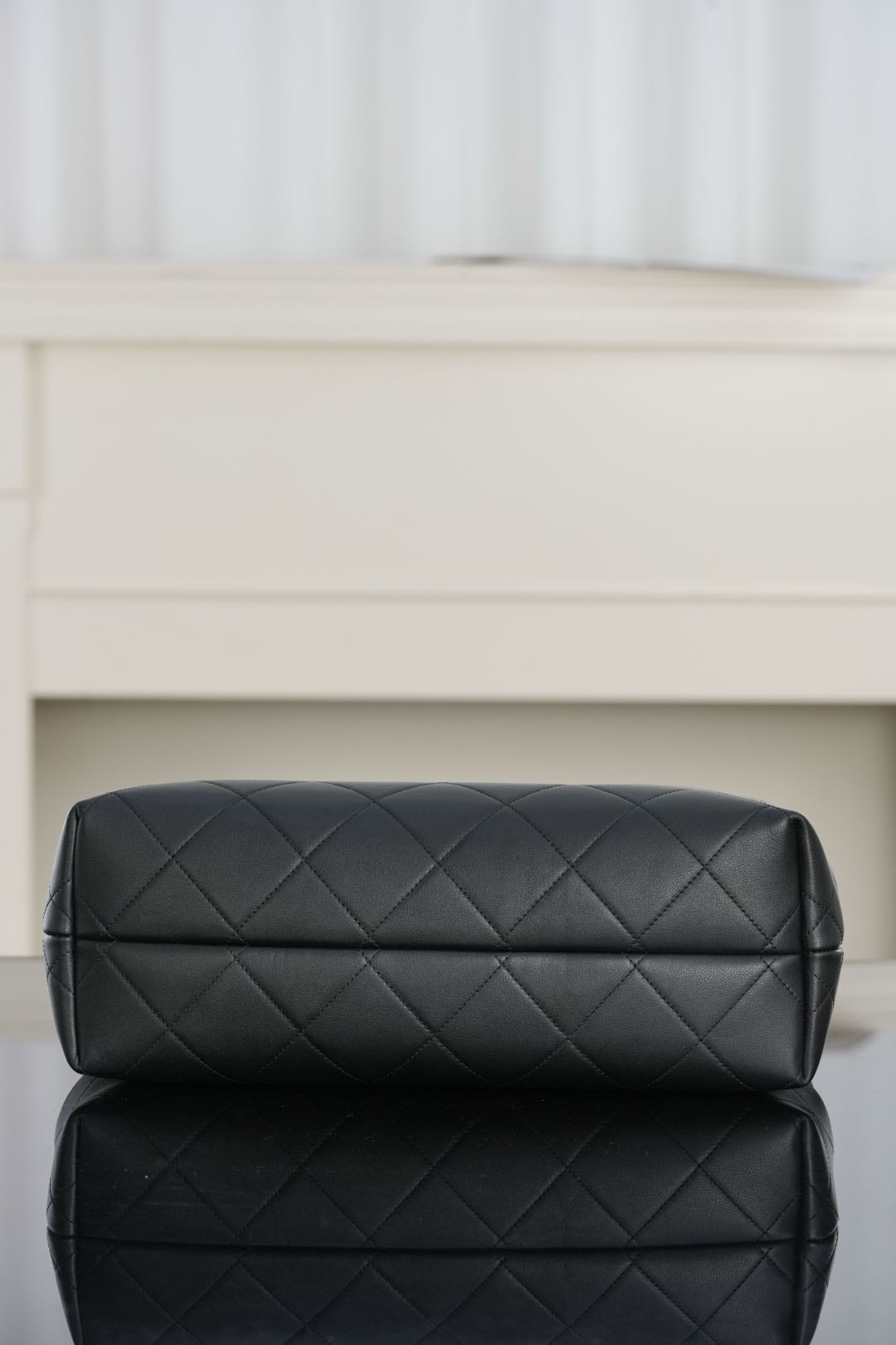 Chanel quilted shoulder bag back panel, diamond pattern in dark leather