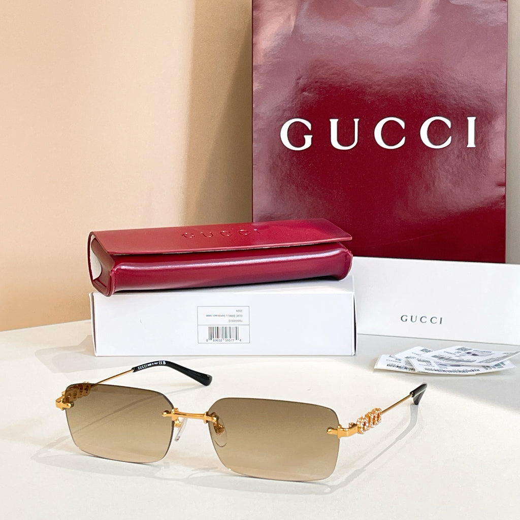 Gucci square sunglasses with amber-tinted lenses and gold-tone embellished frame