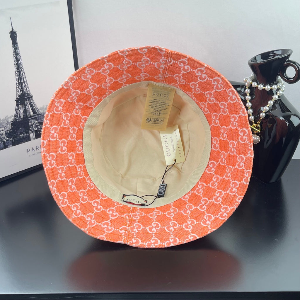 Orange GG-print bucket hat with beige interior lining