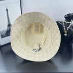 Gucci cap light gold GG monogram, interior lining and tags visible