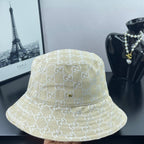 Gucci cap light gold GG monogram, front view with curved crown