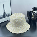 Gucci cap in light gold with allover GG monogram pattern, wide brim