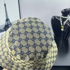 Gucci GG-print bucket cap, light beige with navy pattern, back view