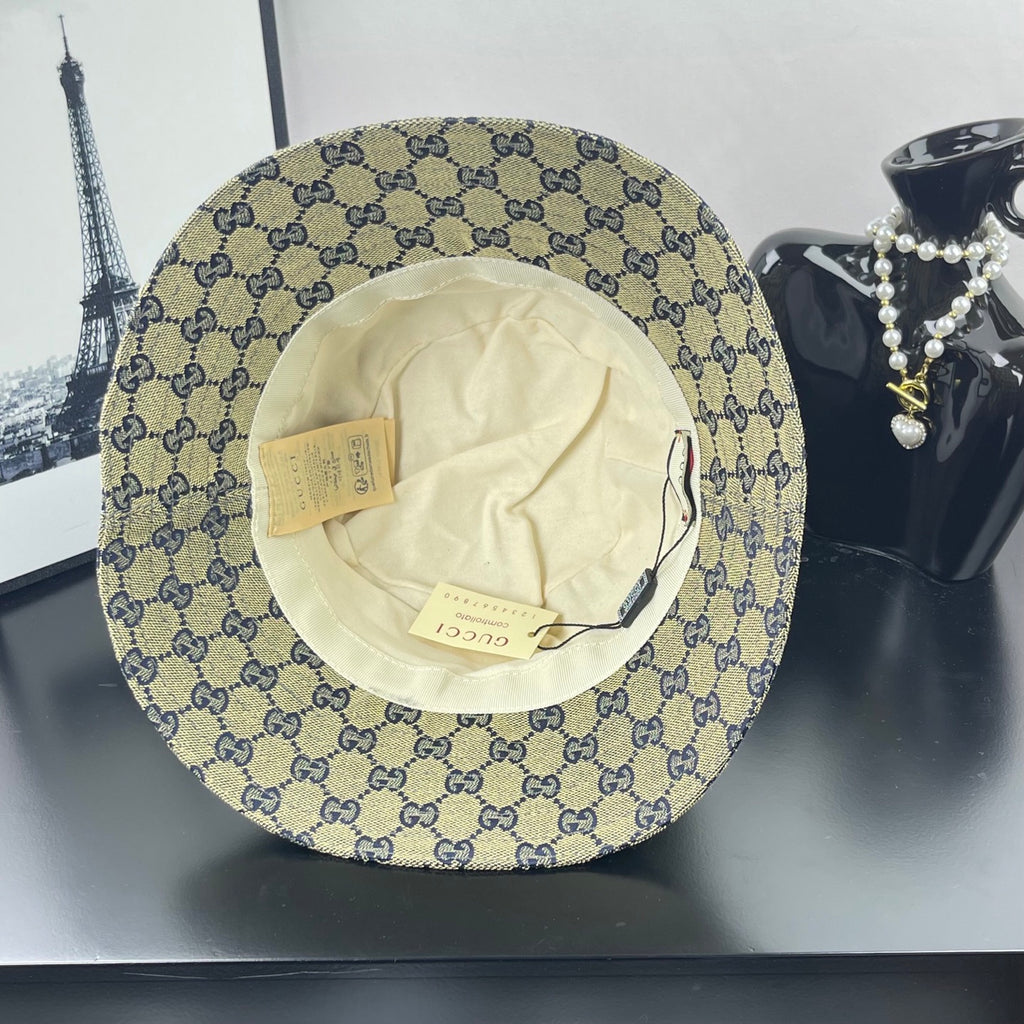 Gucci GG-print bucket cap interior view with tags and cream lining