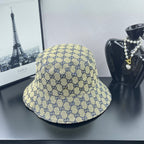 Gucci GG-print bucket cap, light beige with navy pattern