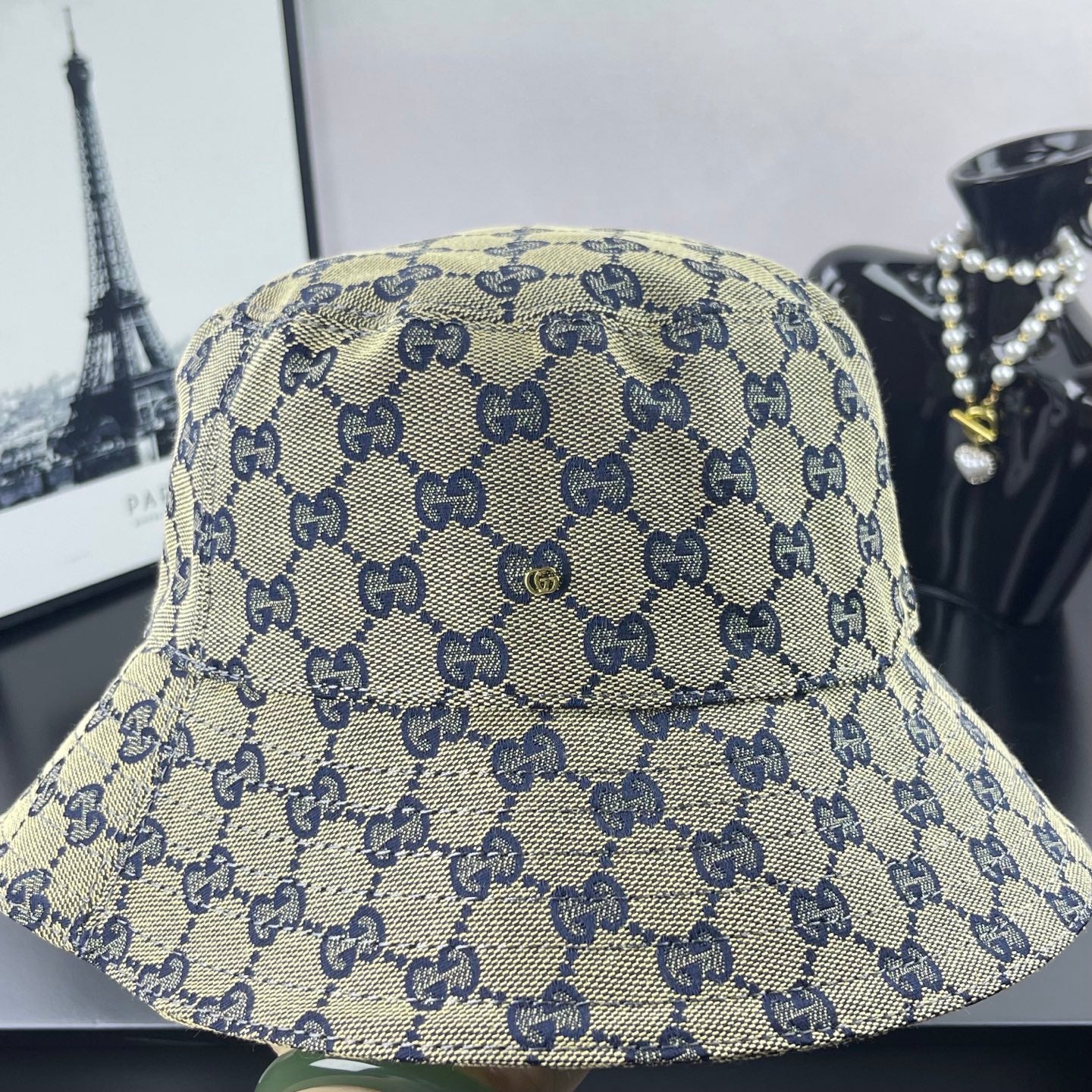 Gucci GG-print bucket cap, light beige with navy pattern and stitched brim