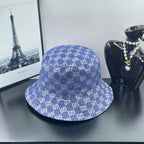 Blue GG monogram bucket cap with stitched brim and crown seam
