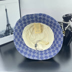 Blue GG monogram bucket cap with beige interior lining and hanging tag