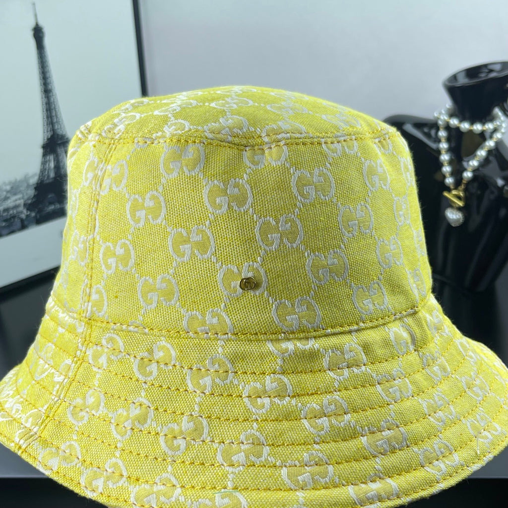 Gucci bucket cap bright yellow with GG monogram texture and wide stitched brim
