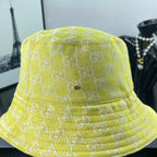 Gucci bucket cap bright yellow with GG monogram texture and wide stitched brim