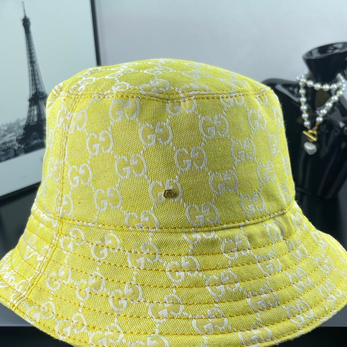 Gucci bucket cap bright yellow with GG monogram texture and wide stitched brim
