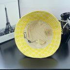 Gucci bucket cap bright yellow with beige inner lining and brand tag inside