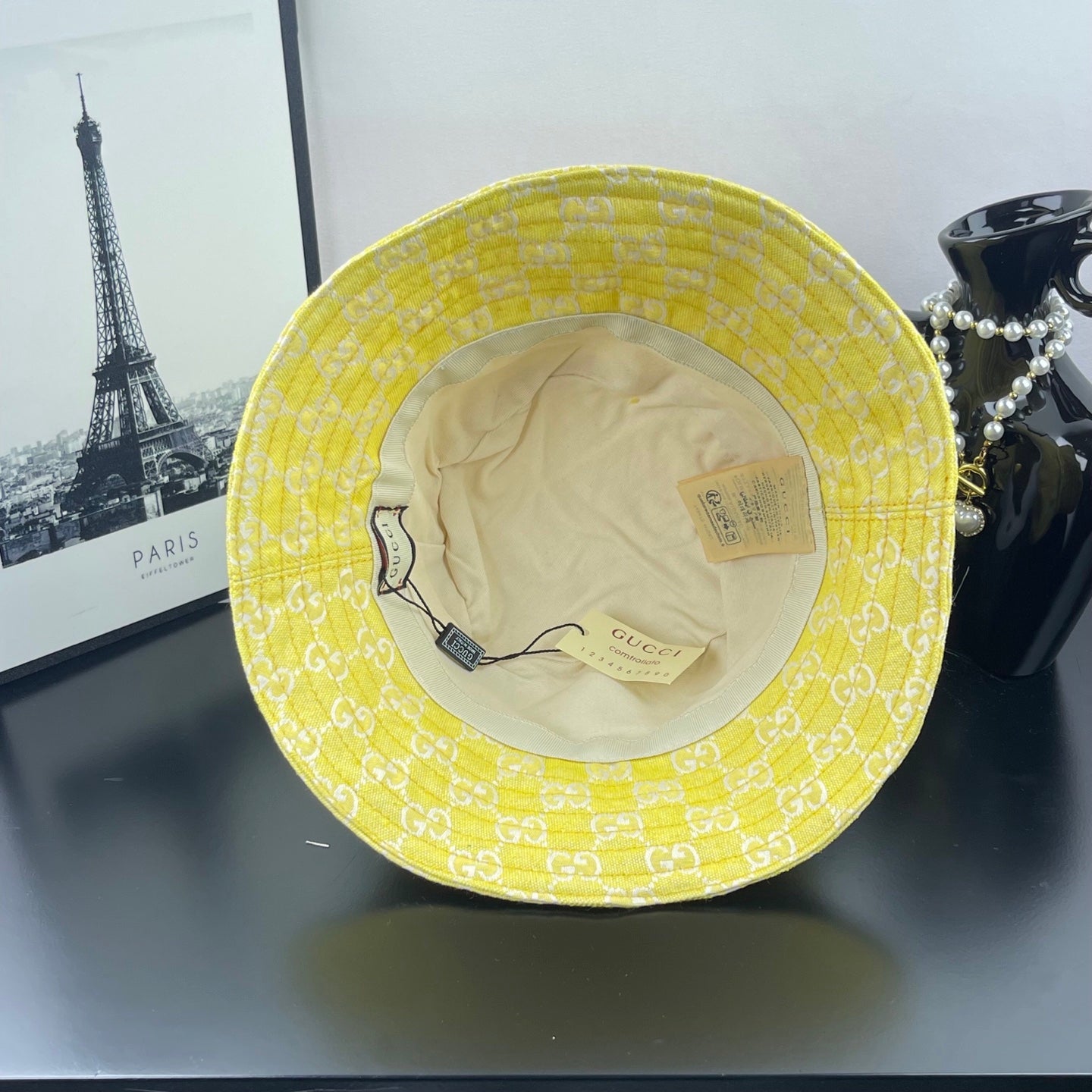 Gucci bucket cap bright yellow with beige inner lining and brand tag inside