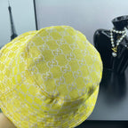 Gucci bucket cap bright yellow with GG monogram fabric and curved side seam