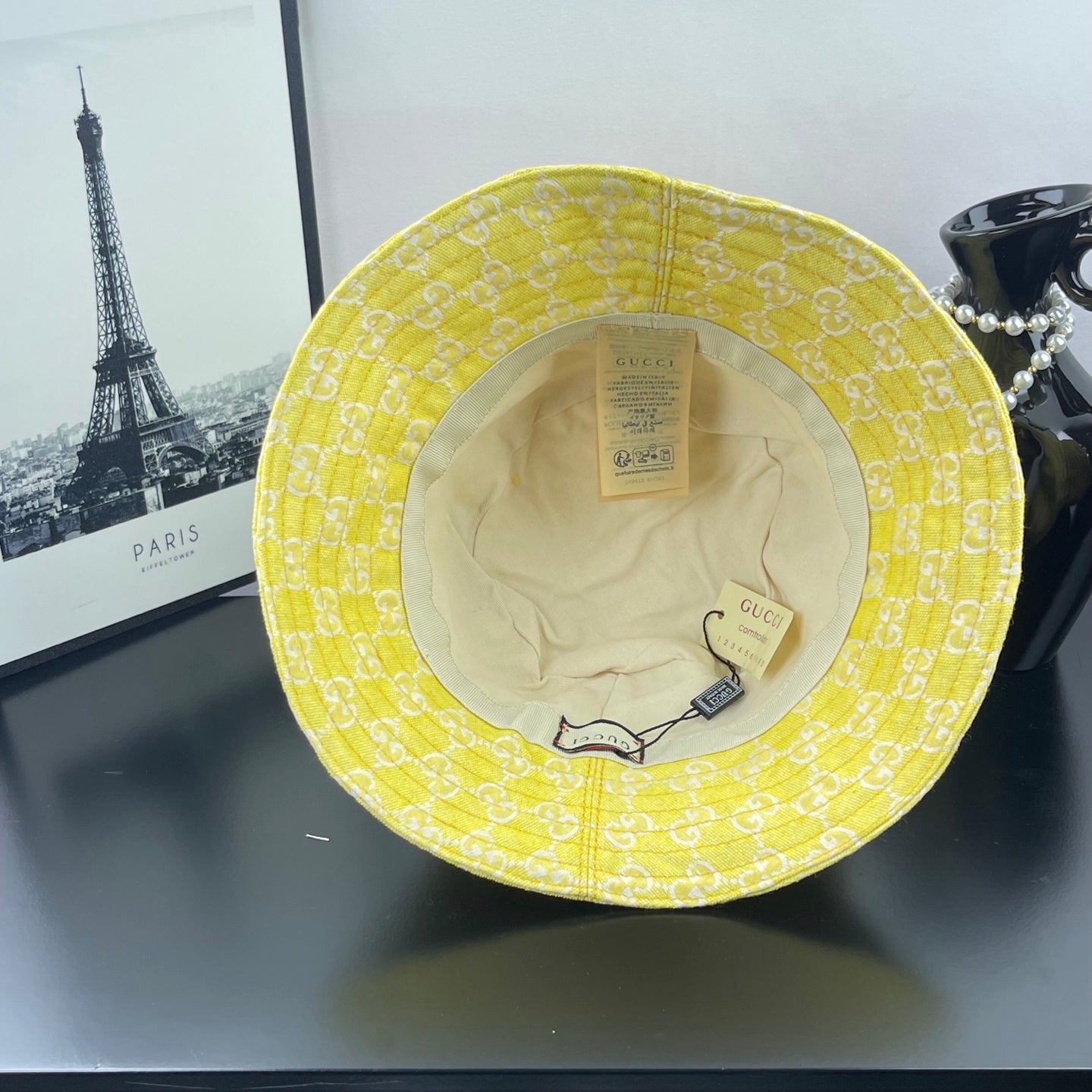 Gucci bucket cap bright yellow with beige lining and Gucci tag inside