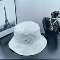 Gucci white GG monogram bucket cap with stitched brim and small gold rivet