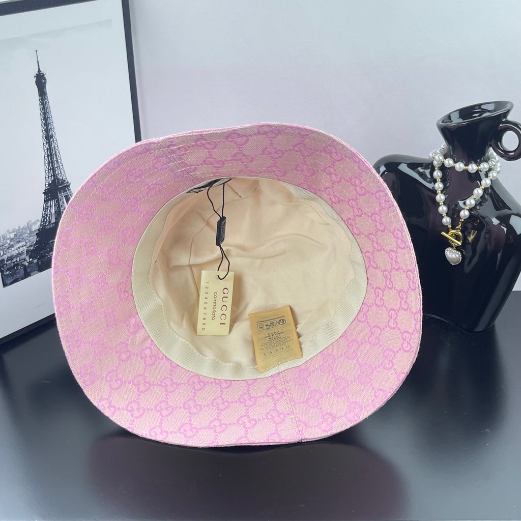 Gucci pink GG monogram bucket hat with beige interior lining and tags
