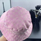 Gucci pink GG monogram bucket hat, side view