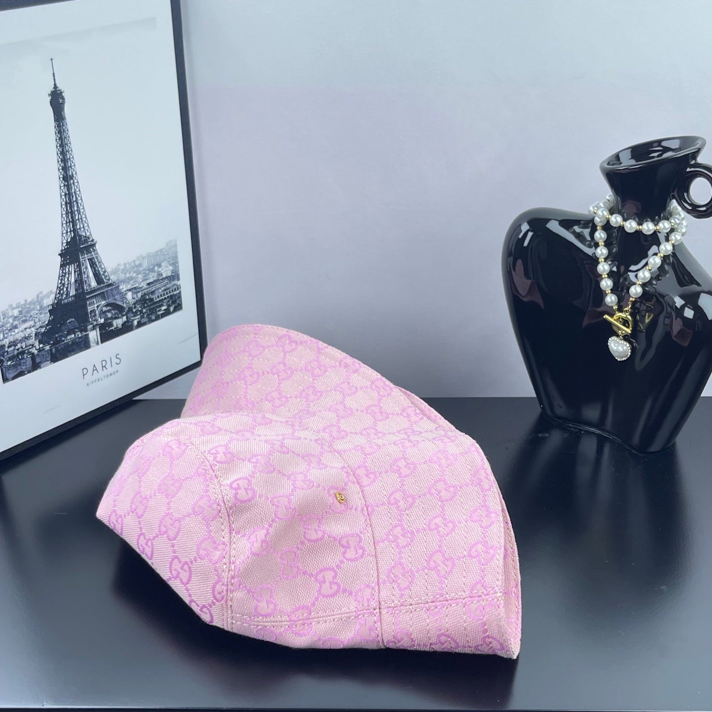 Gucci pink GG monogram bucket hat with curved back panel seam