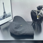 Gray GG monogram bucket hat with front seam and small gold logo