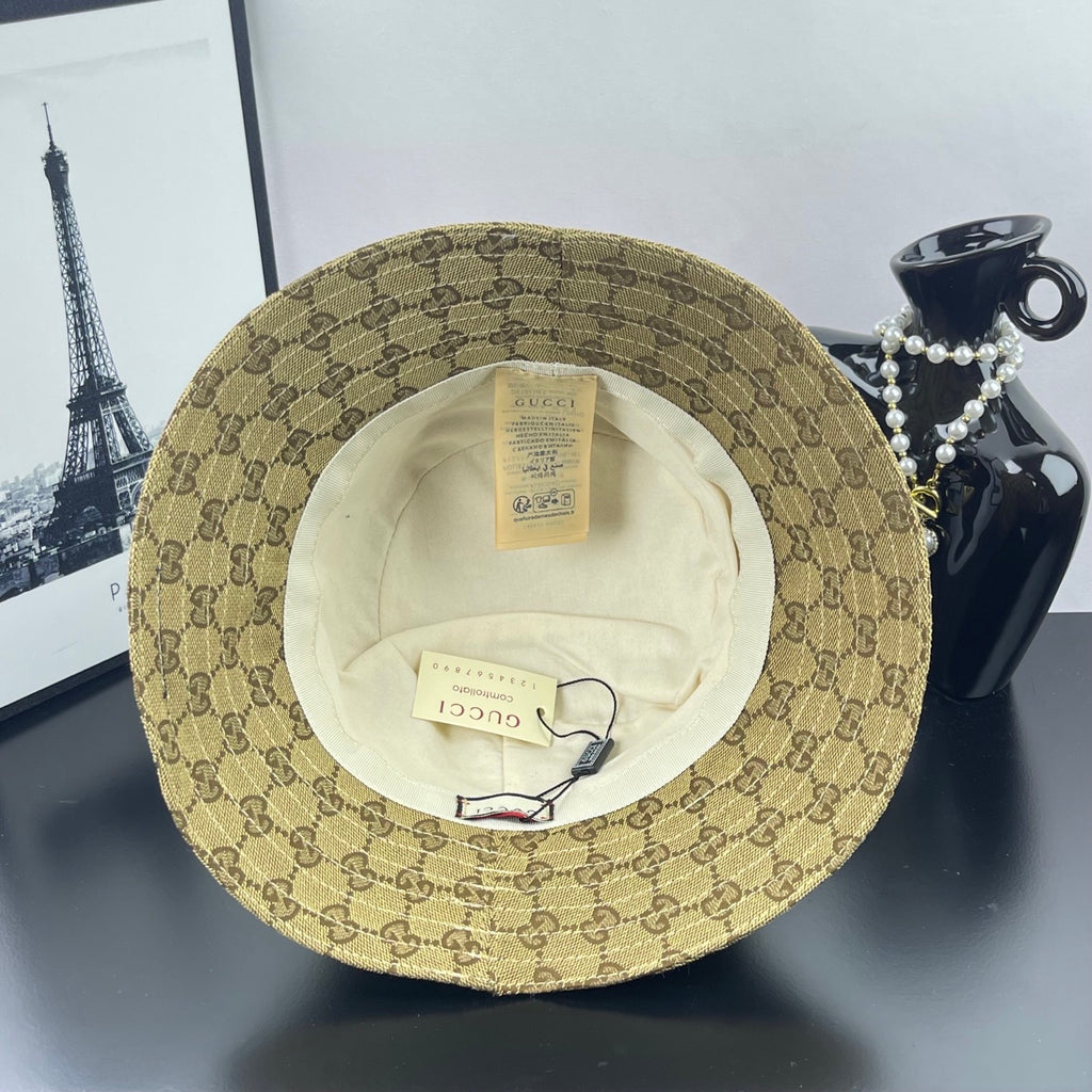 Gucci GG monogram bucket cap, tan; interior lining and size label shown