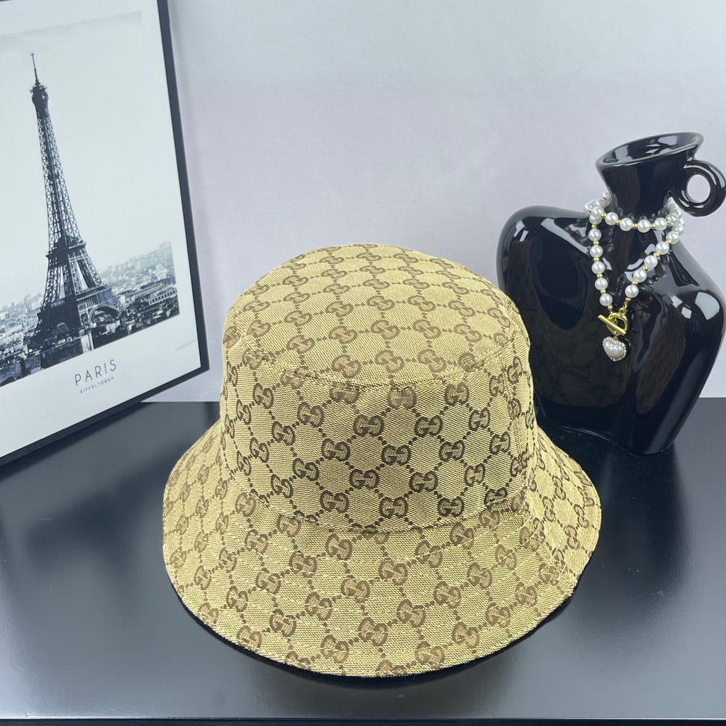 Gucci GG monogram bucket cap, tan with dark brown allover pattern, side view