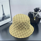 Gucci GG monogram bucket cap, tan with dark brown allover pattern, side view