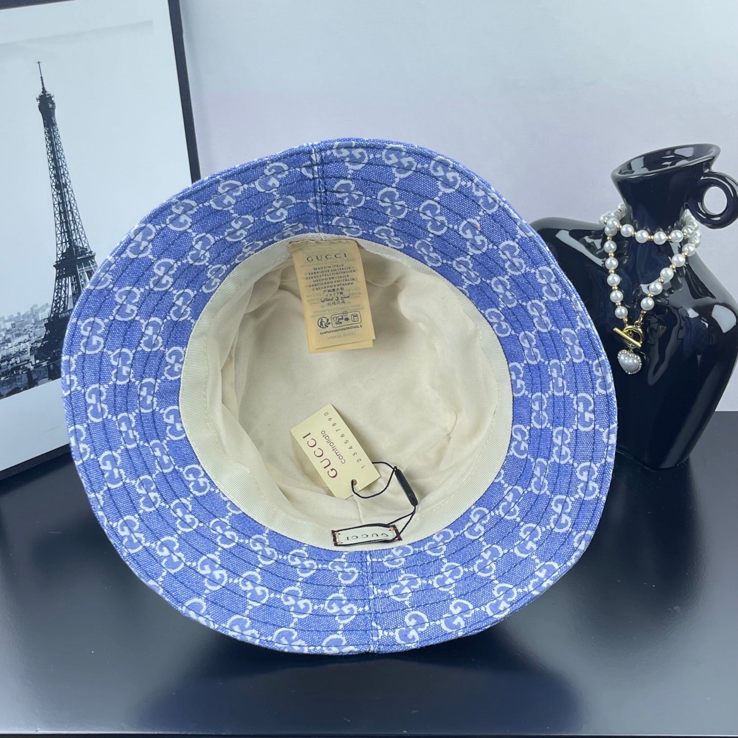 Blue GG monogram bucket hat interior with hanging tags