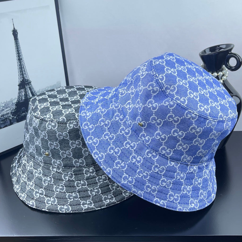 Bucket hats set with GG monogram patterns, blue and gray, side by side