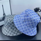 Bucket hats set with GG monogram patterns, blue and gray, side by side