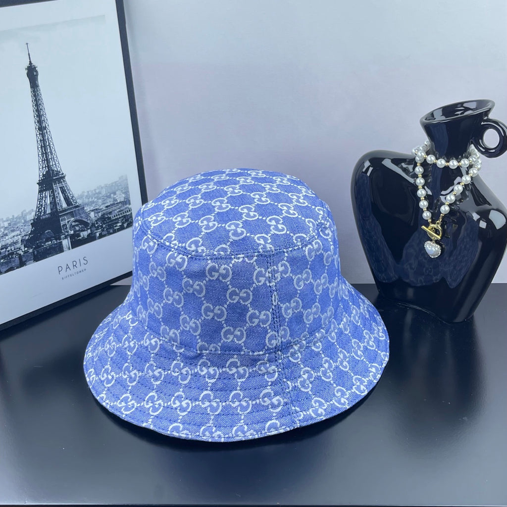 Blue GG monogram bucket hat, side view with wide brim