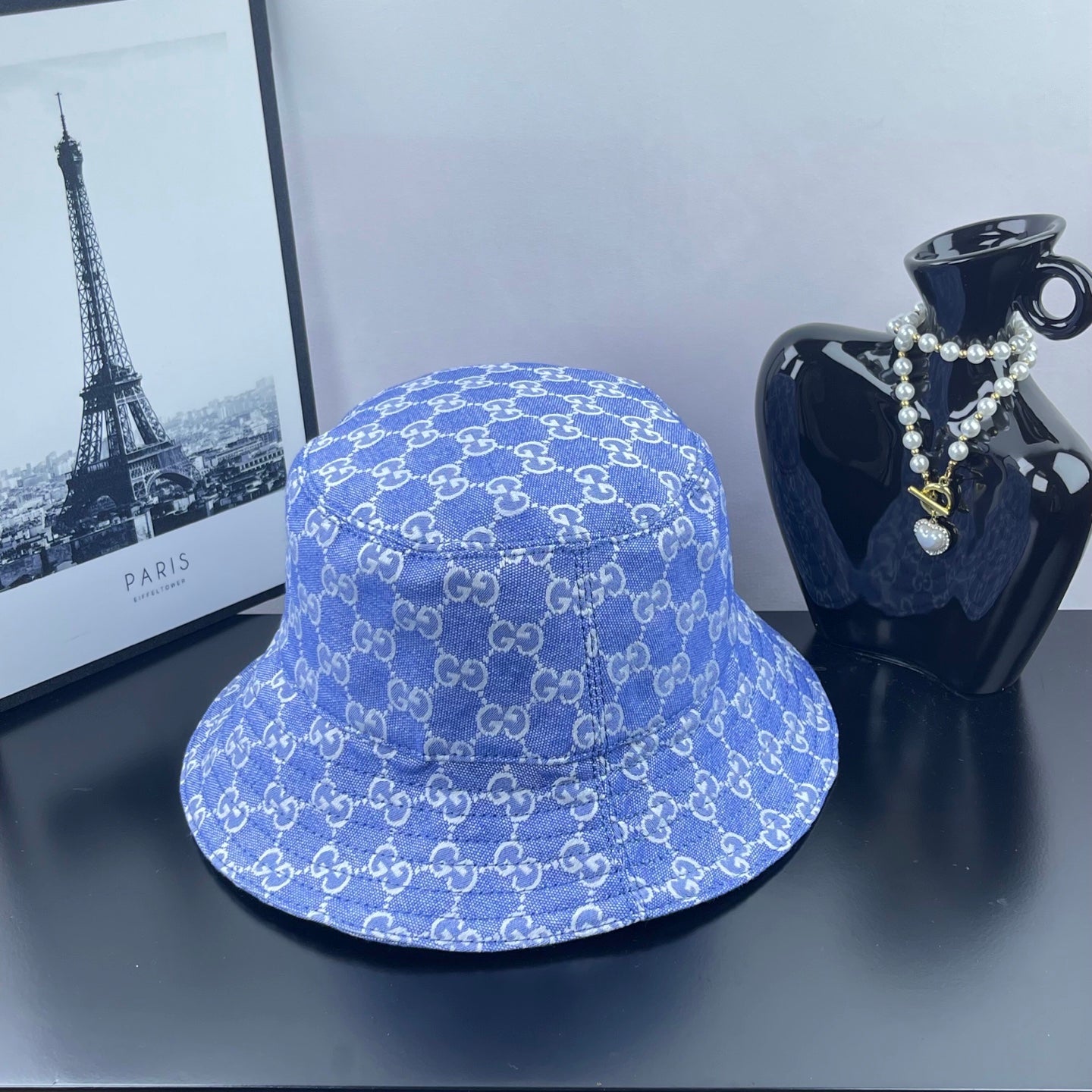 Blue GG monogram bucket hat, side view with wide brim