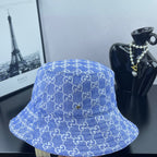 Blue GG monogram bucket hat, front view with wide brim