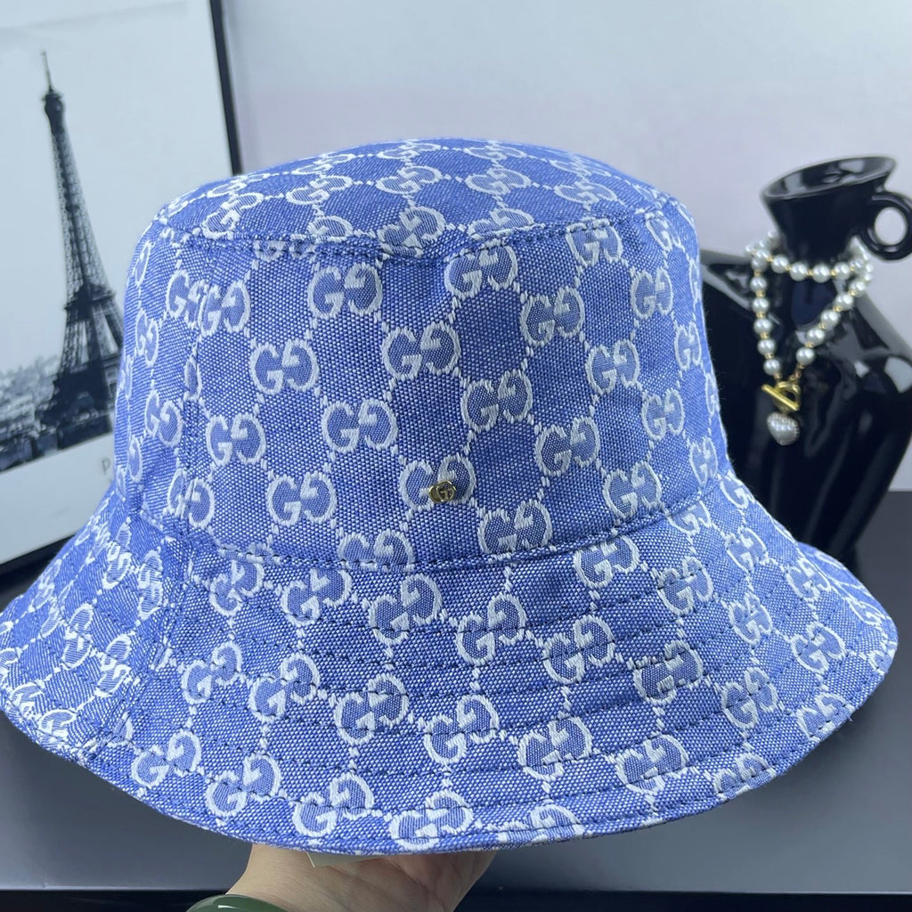 Blue GG monogram bucket hat, top view with stitched seams